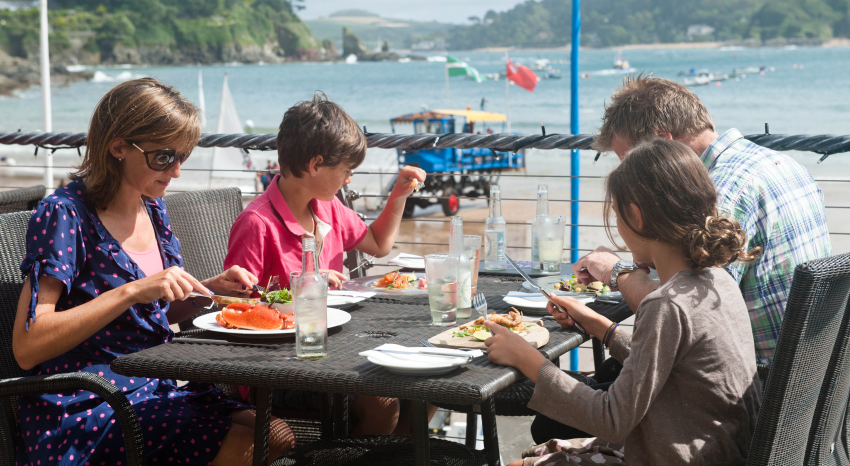 Family dining by the sea at the Beachside Restaurant, Salcombe